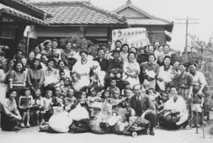 Widows and children outside workshop and hostel at Toyohashi.Box 52, Folder 8